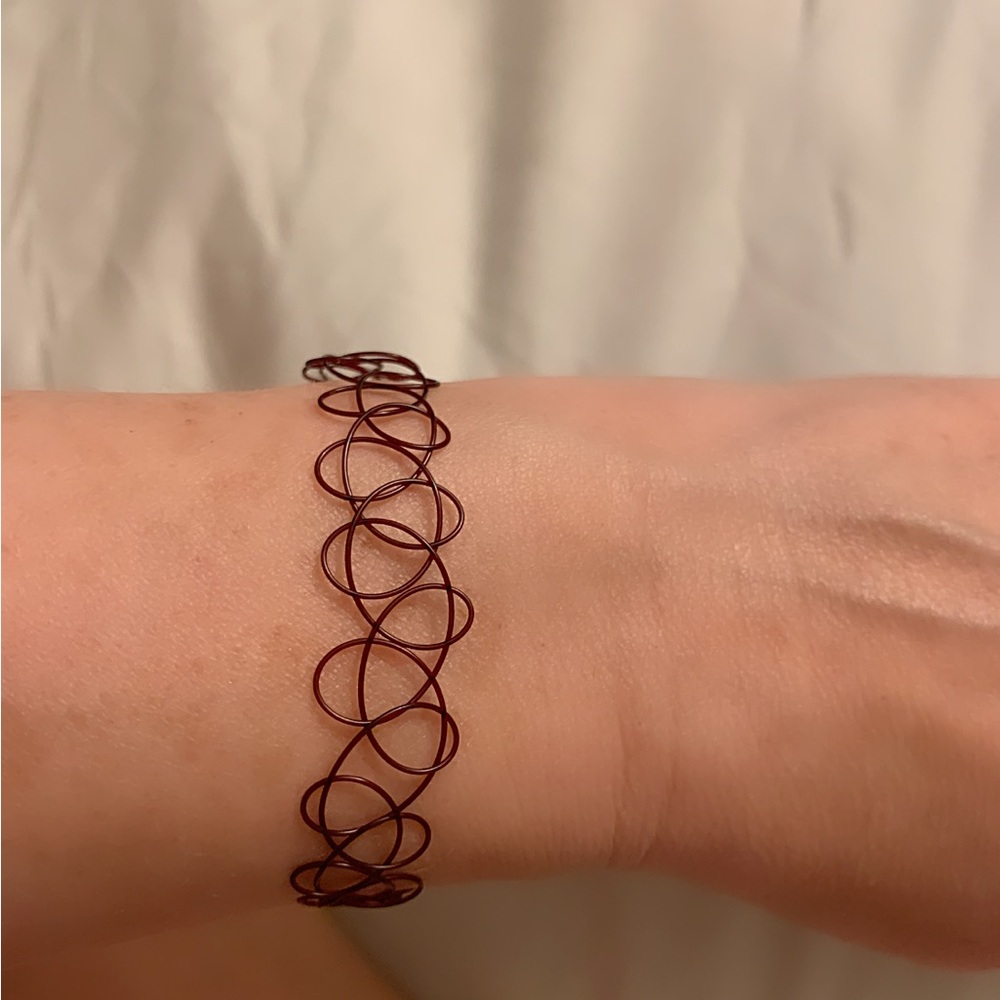 Brand new brown plastic tattoo like ankle  bracelet . Must have for Diva!